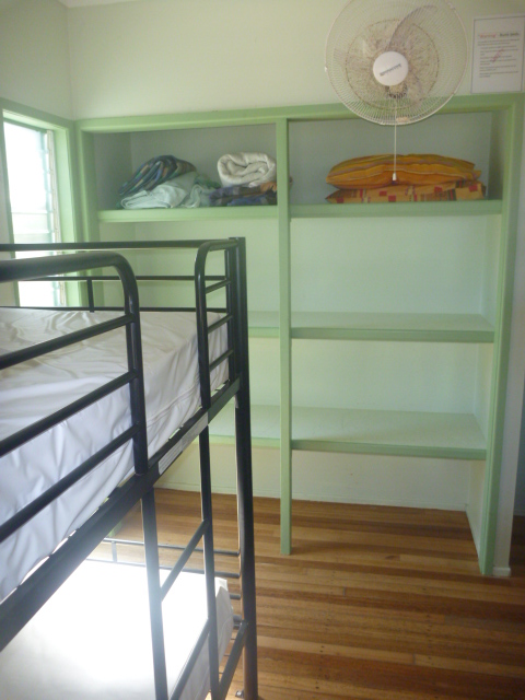 Inside a visitor accommodation cabin with bunk beds