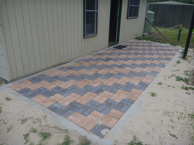 New paving at the entrance to the cultural museum cabin