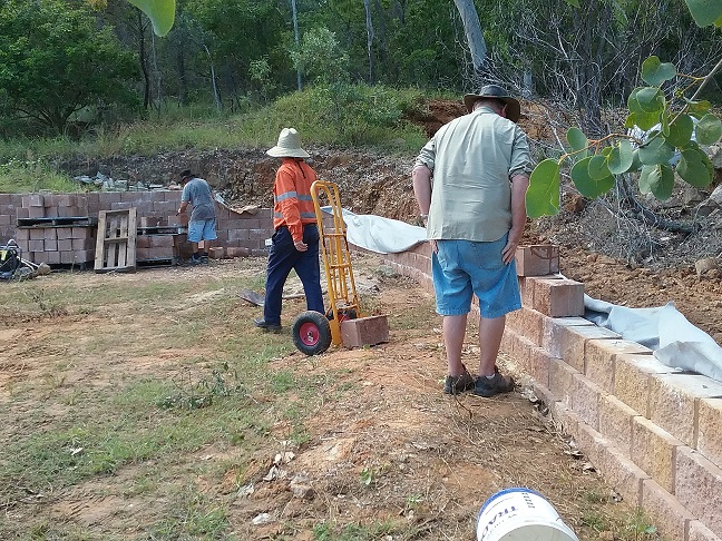 Building a retaining wall around the side of the centre