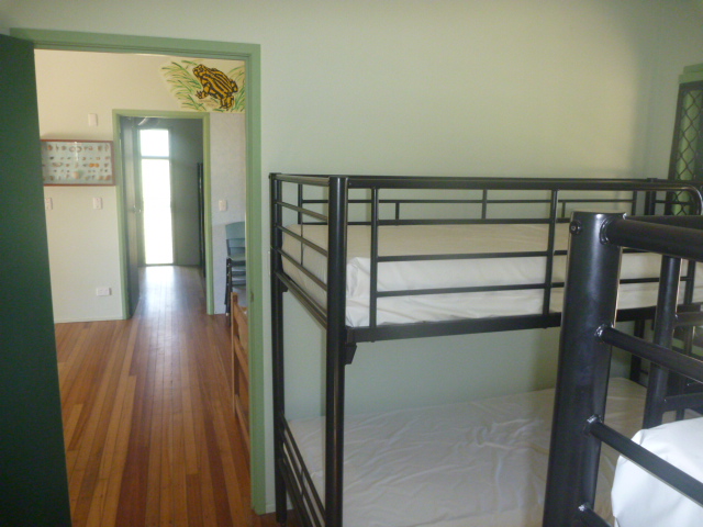Above: Inside a visitor accommodation cabin with bunk beds.